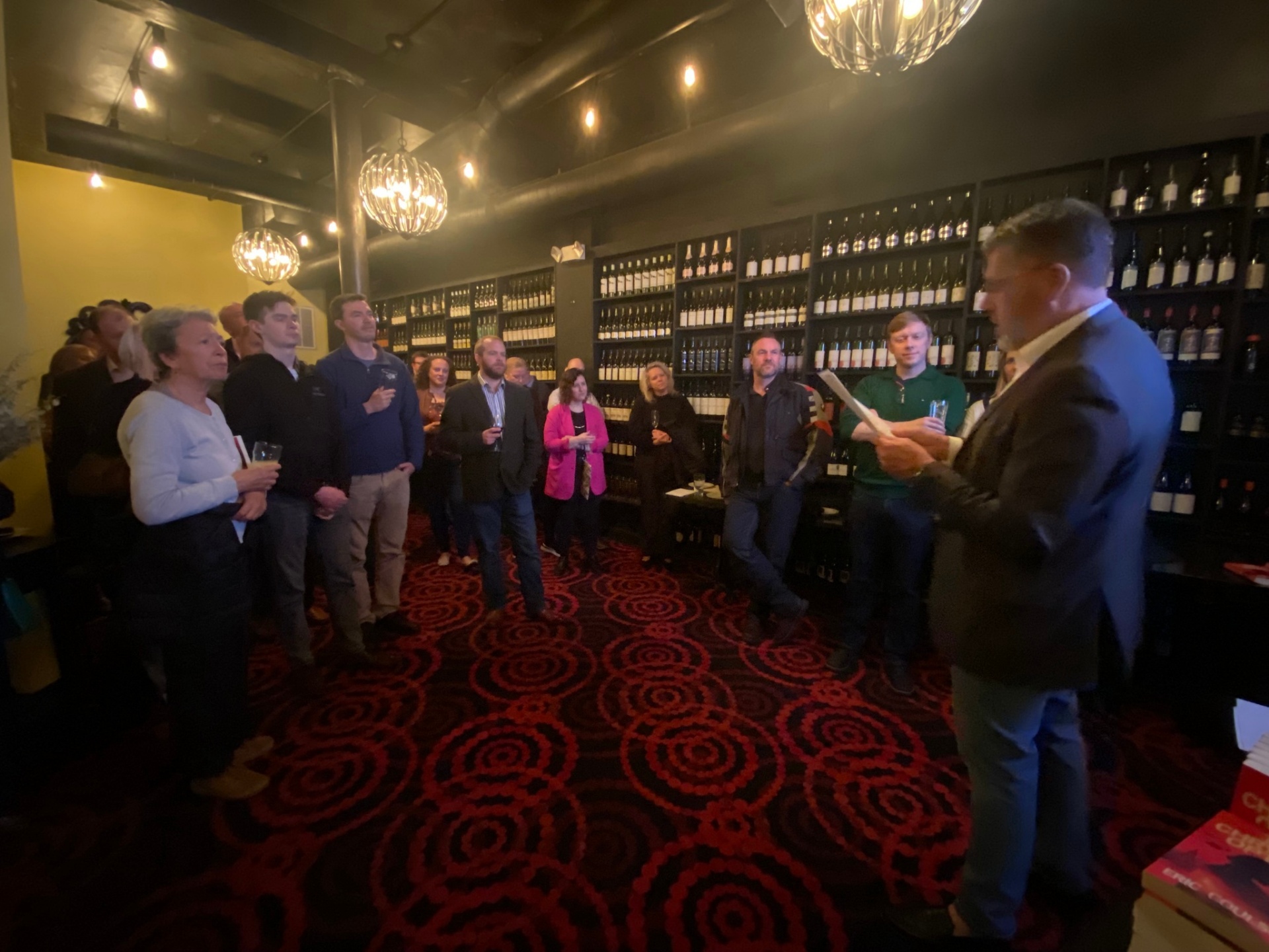 Eric Coulson reading from The Chrysalis Option at a wine bar event