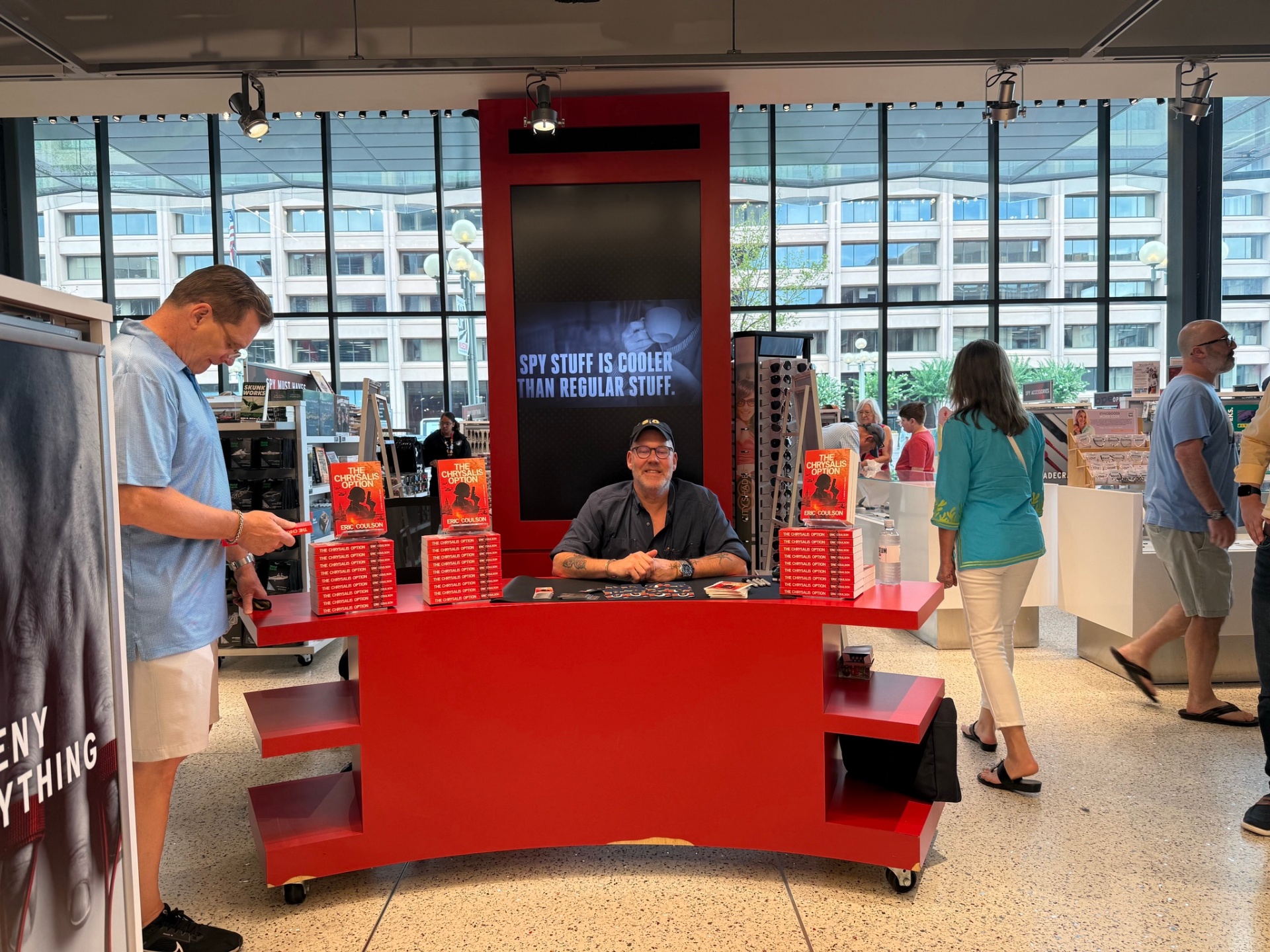 Eric Coulson signing books at the Spy Museum