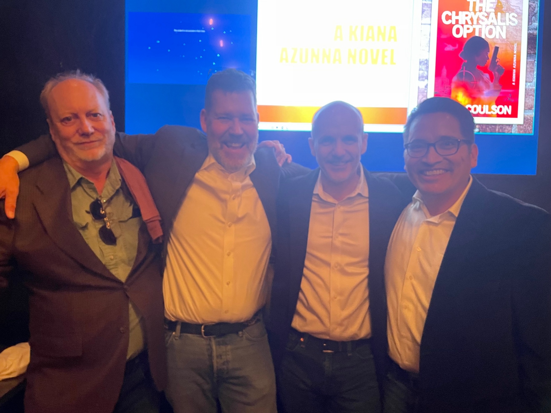 Eric Coulson with friends at a book launch event